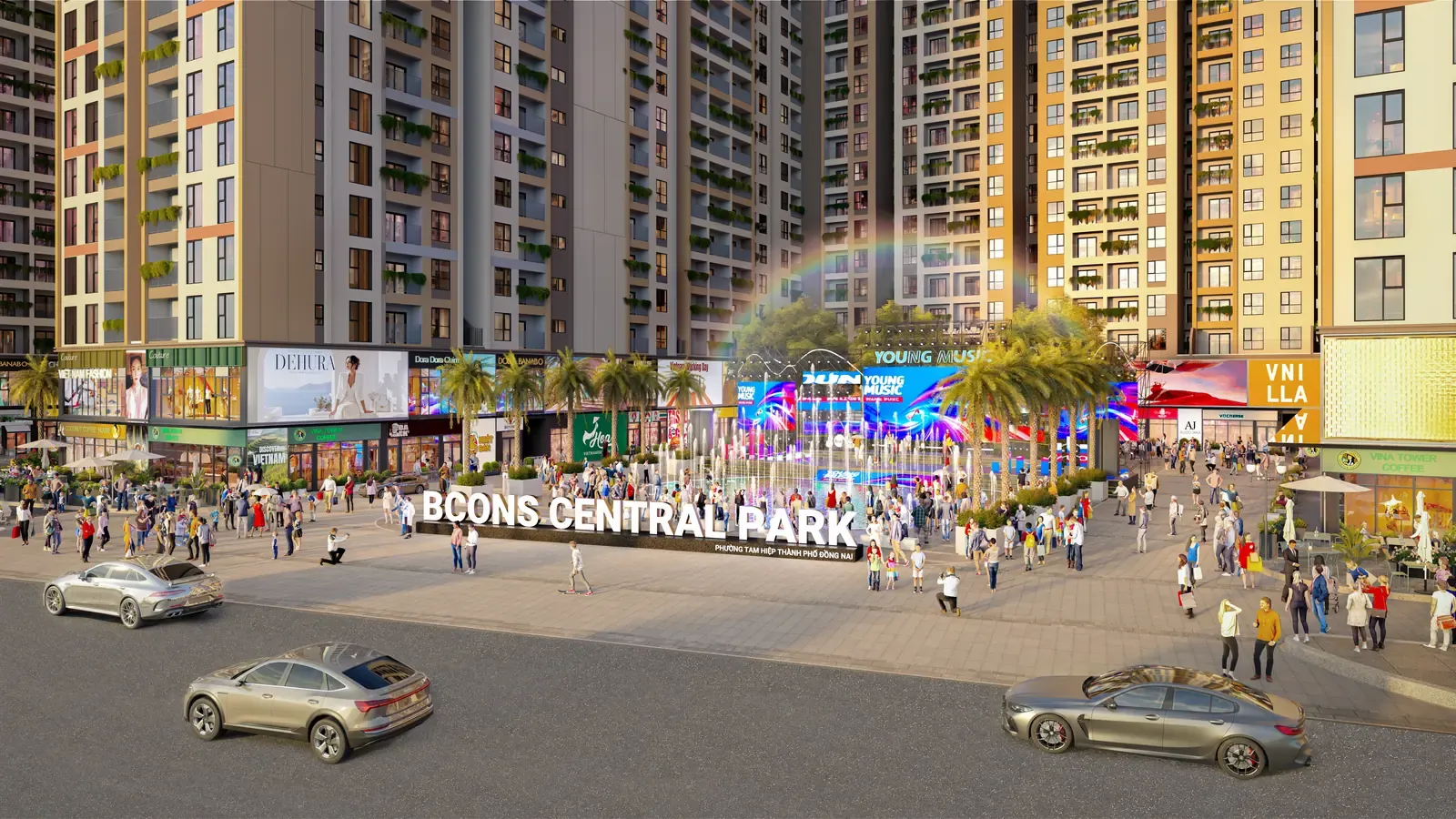 Cổng chính và quảng trường trung tâm Bcons Central Park Tam Hiệp với biển hiệu Bcons Central Park, dãy shophouse hai bên