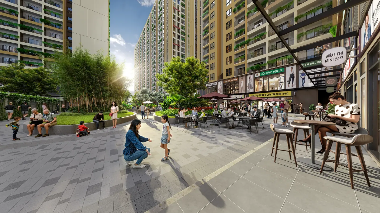 Quảng trường sinh hoạt trước dãy shophouse Bcons Central Park Tam Hiệp với bàn ghế ngoài trời và cây xanh